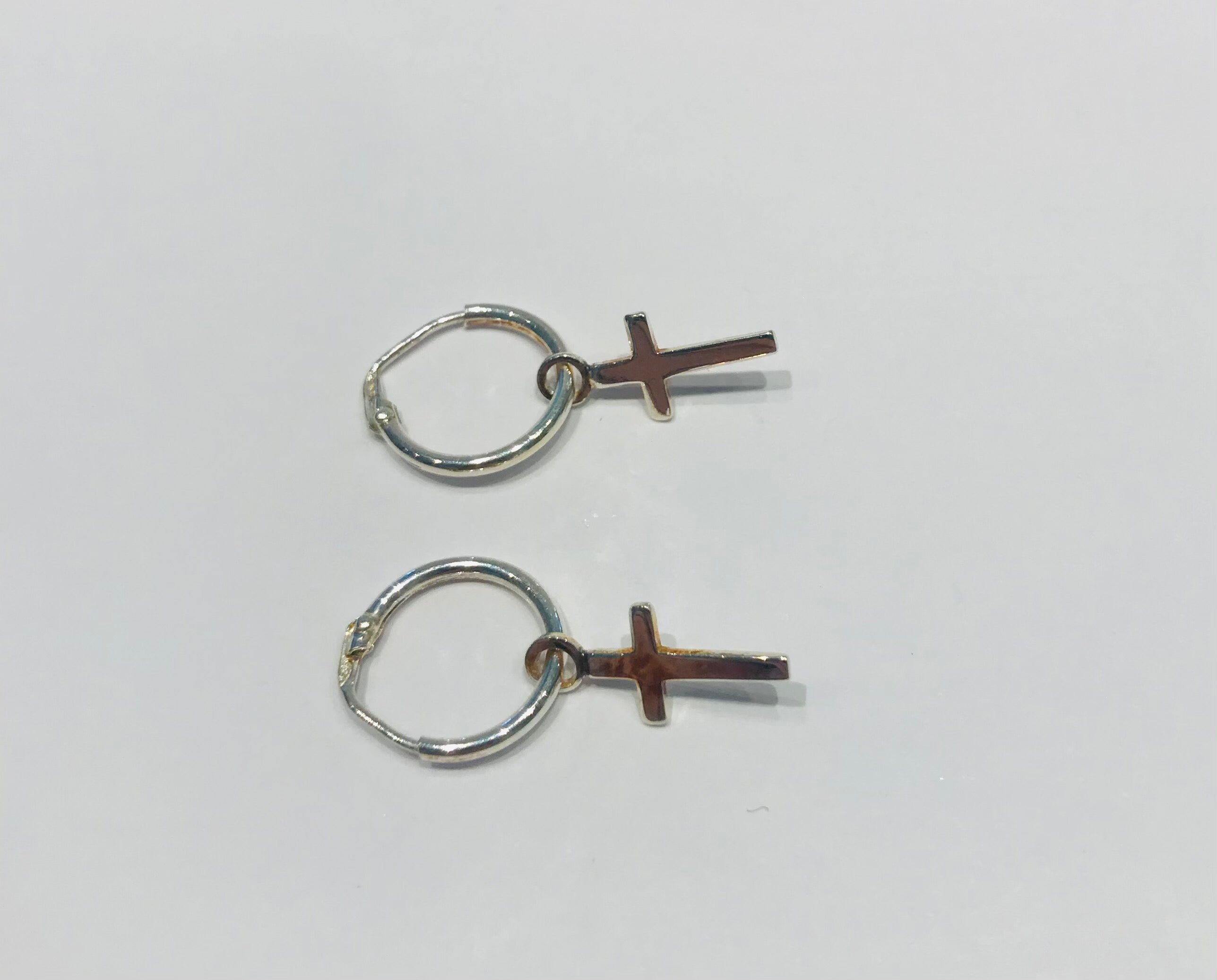 SAM&CEL - silver creoles with cross pendant