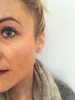 SAM&CEL - silver creoles with cross pendant