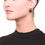 Wouters & Hendrix -  gold plated silver earrings with hematite and ceramic
