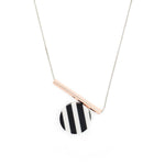 Wouters & Hendrix -  silver black and white striped circle resin and pink necklace