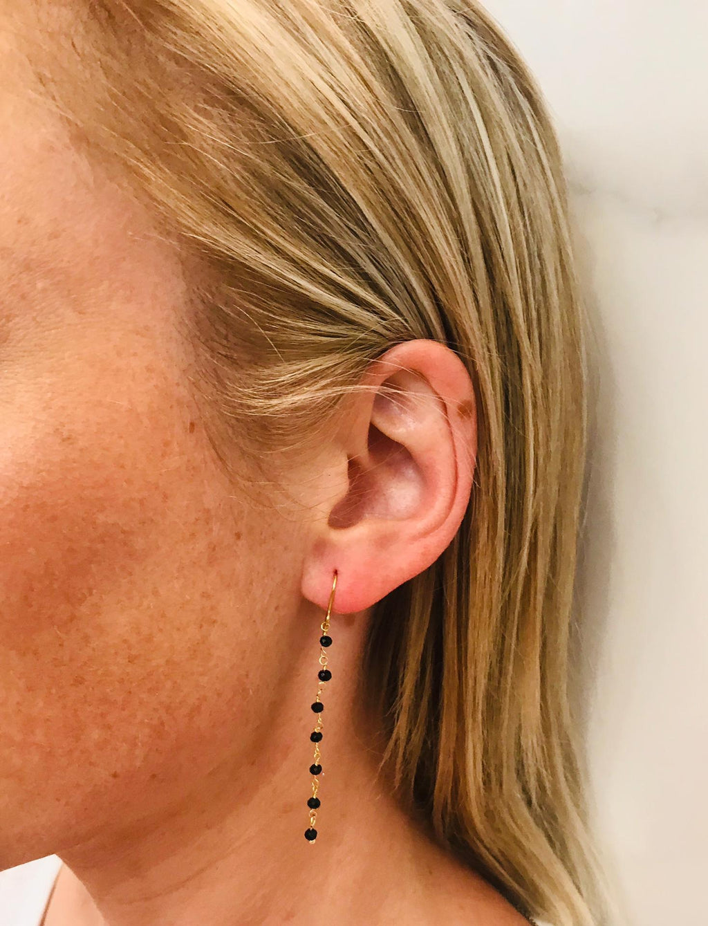 Steel earrings with black crystals by SAM&CEL. 