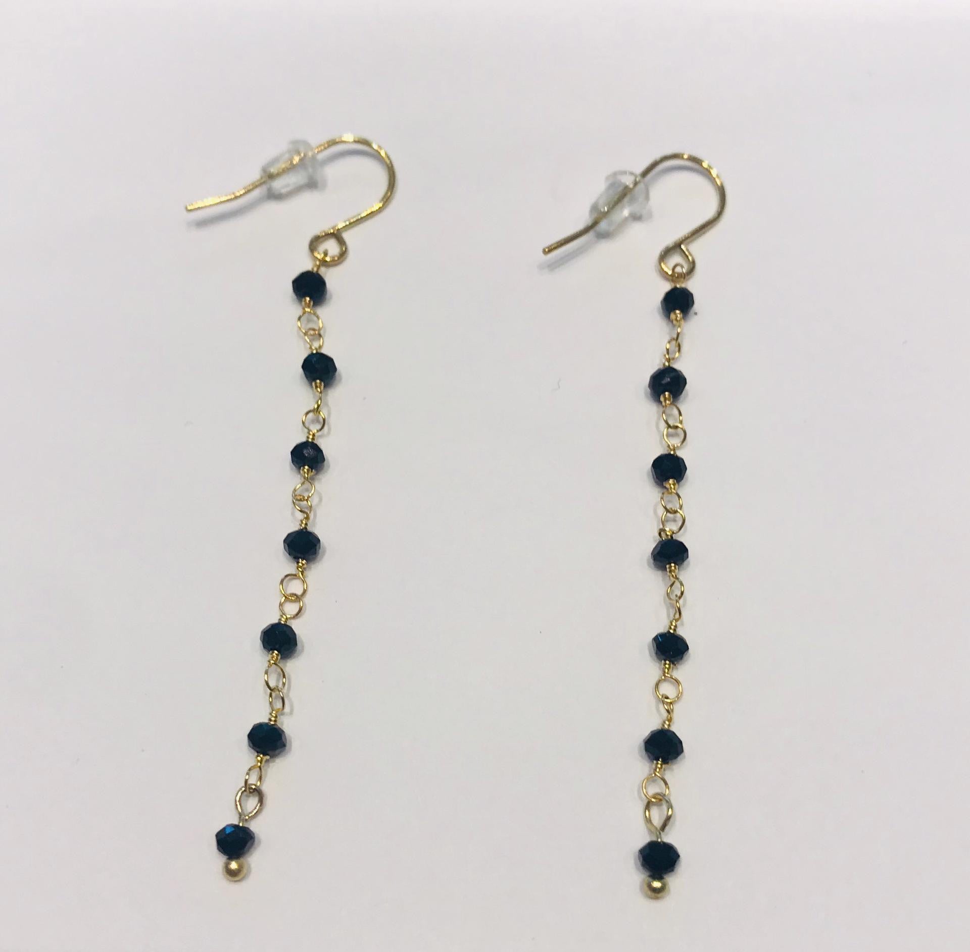 Steel earrings with black crystals by SAM&CEL. 