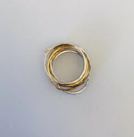  this 7 mix ring by Wouters & Hendrix. The ring include 7 separate rings of which 5 are silver and 2 gold plated. 2 of the silver rings and 1 gold plated ring have an oval shape. 