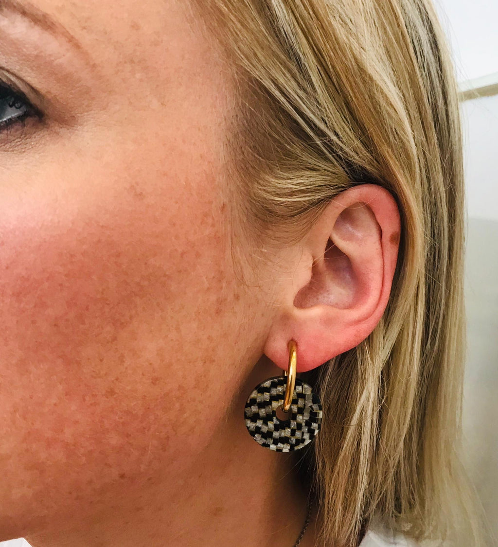 Steel creole earrings with resin pendant