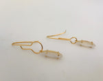 Wouters & Hendrix -  gold plated asymmetric earrings with mother of pearl