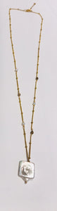 Large link necklace in steel with long freshwater pearls by SAM&CEL.