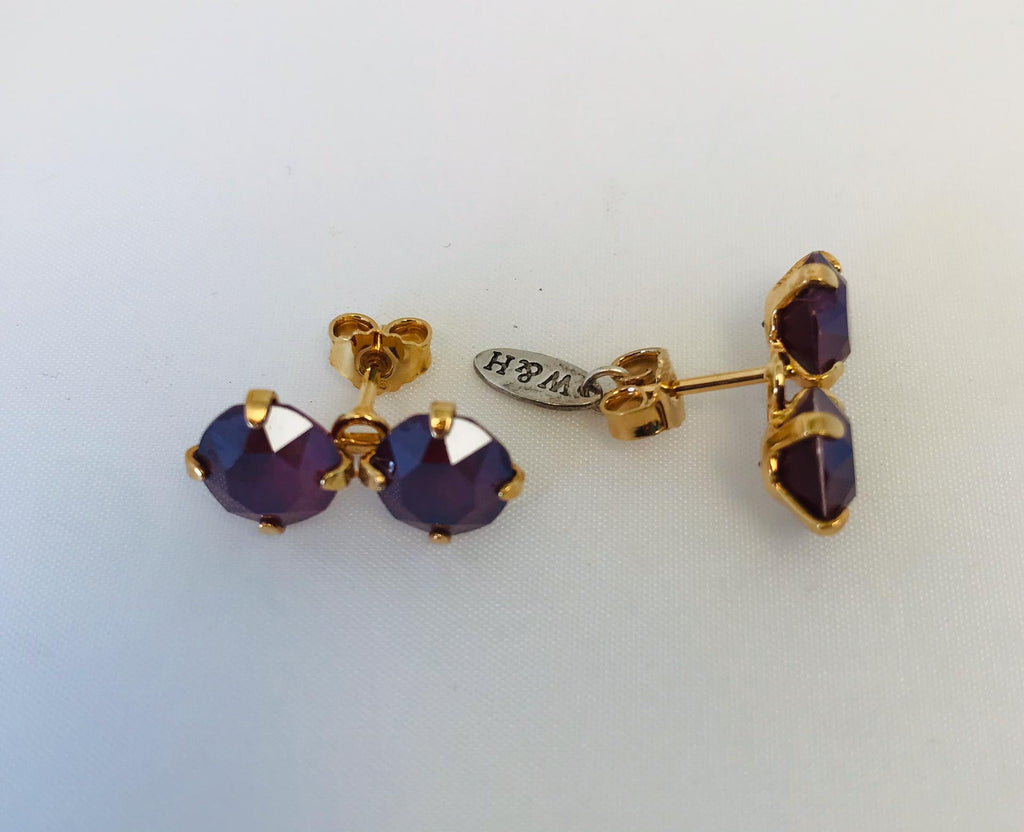 Wouters & Hendrix - gold plated double purple crystal earrings