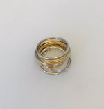  this 7 mix ring by Wouters & Hendrix. The ring include 7 separate rings of which 5 are silver and 2 gold plated. 2 of the silver rings and 1 gold plated ring have an oval shape. 