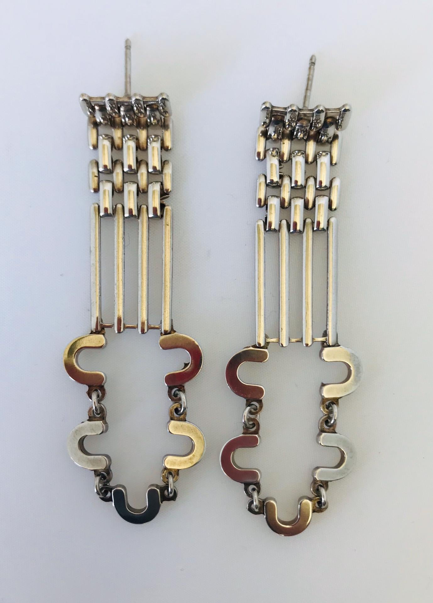 Wouters & Hendrix - long silver statement earrings