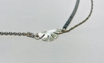 Atelier Elf silver necklace with papyrus and plexy swing