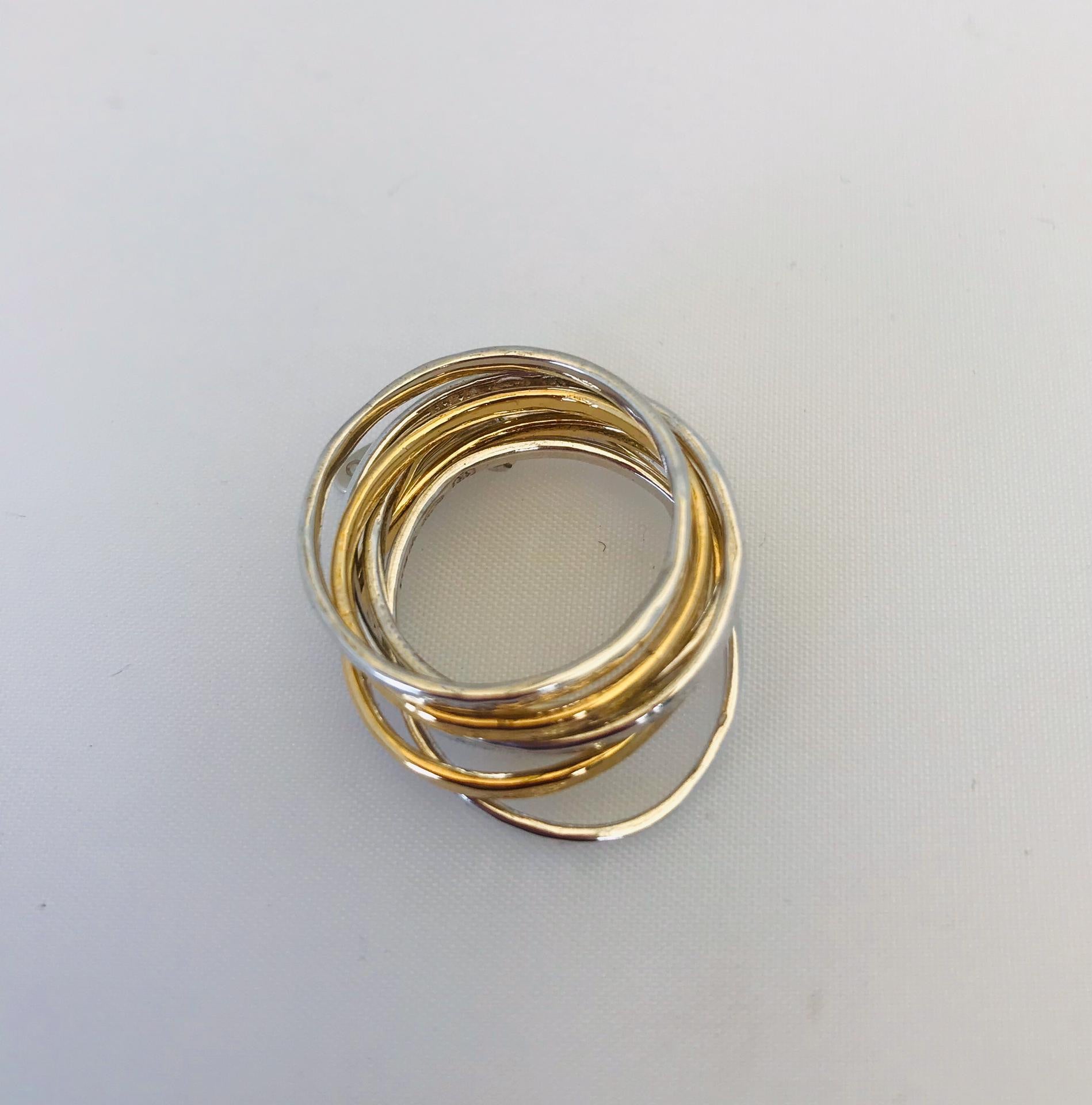  this 7 mix ring by Wouters & Hendrix. The ring include 7 separate rings of which 5 are silver and 2 gold plated. 2 of the silver rings and 1 gold plated ring have an oval shape. 