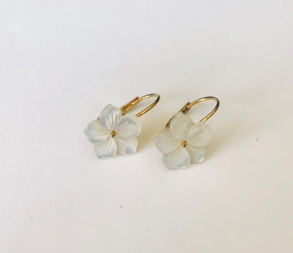 Wouters & Hendrix - gold plated earrings with mother of pearl flower