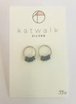 Sterling silver 925 simple hoops with tiny blue dangling rings by the Belgian brand Katwalk Silver. 