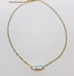 Steel necklace with freshwater pearl and necklace extender to long lengths. Necklace by SAM&CEL.