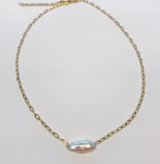 Steel necklace with freshwater pearl and necklace extender to long lengths. Necklace by SAM&CEL.