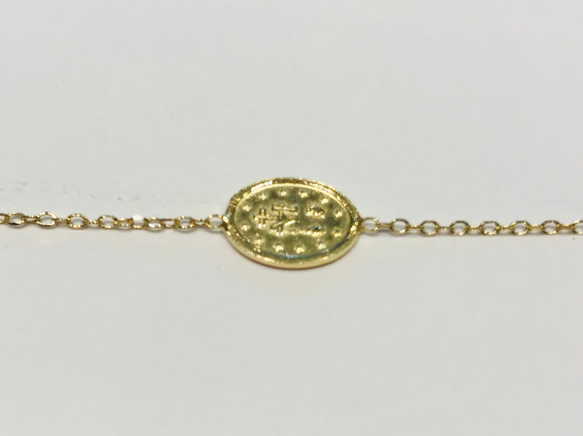 SAM&CEL goldplated bracelet with oval coin