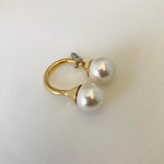 Wouters & Hendrix - gold plated ring with 2 crystal pearls